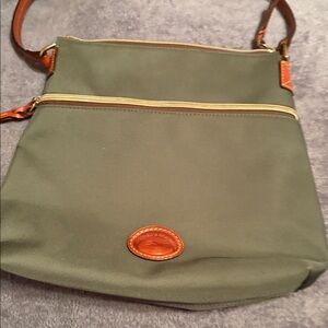 Dooney & Bourke Classic Green Canvas Shoulder bag with brown leather trim.